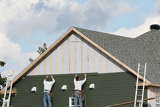 Professional Storm Damage Siding Repair technician working in Latrobe, PA